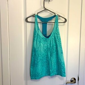 The North face workout tank, size large, blue/teal patterned